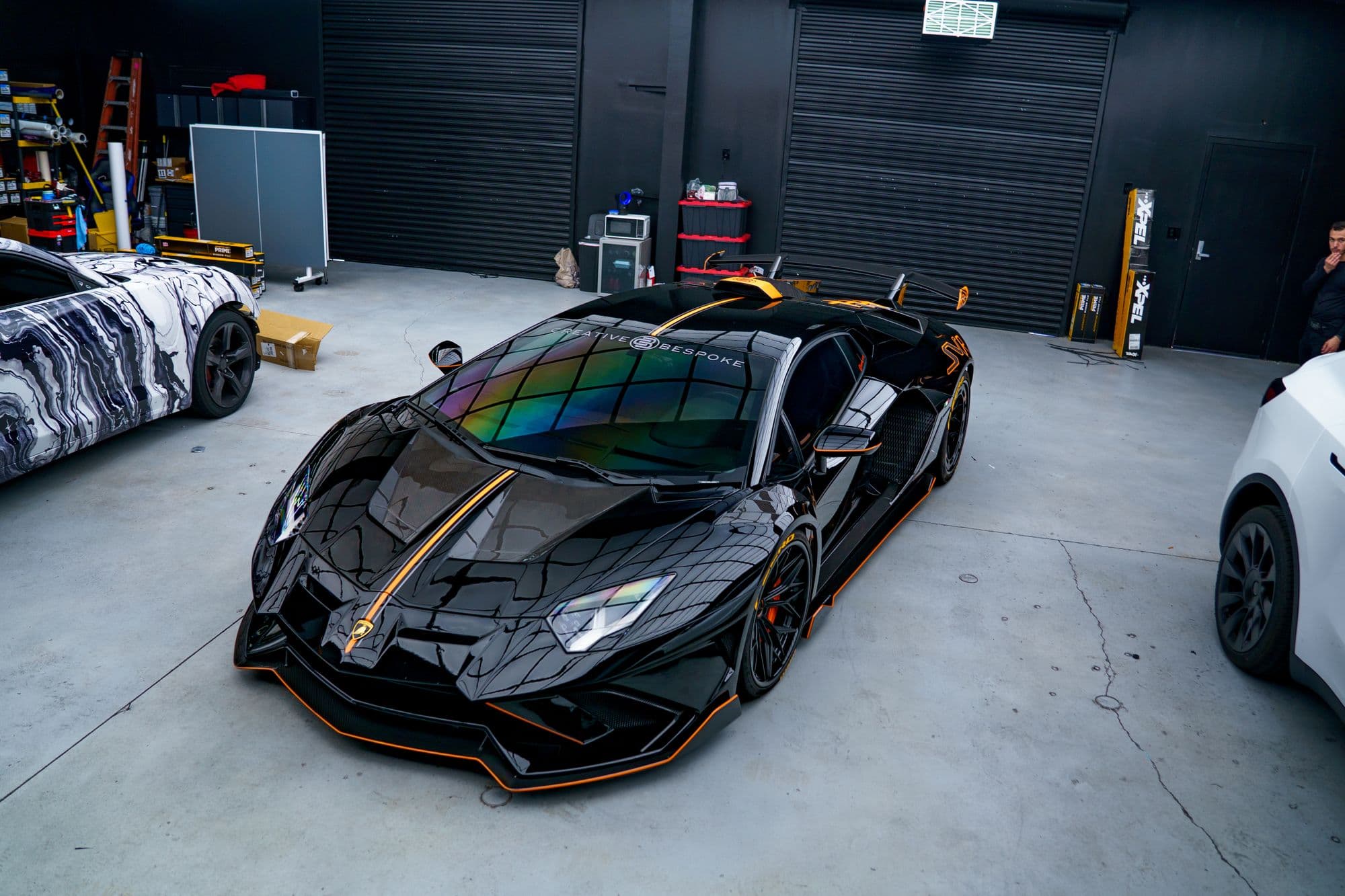 Finished performance vehicle with deep reflective paint